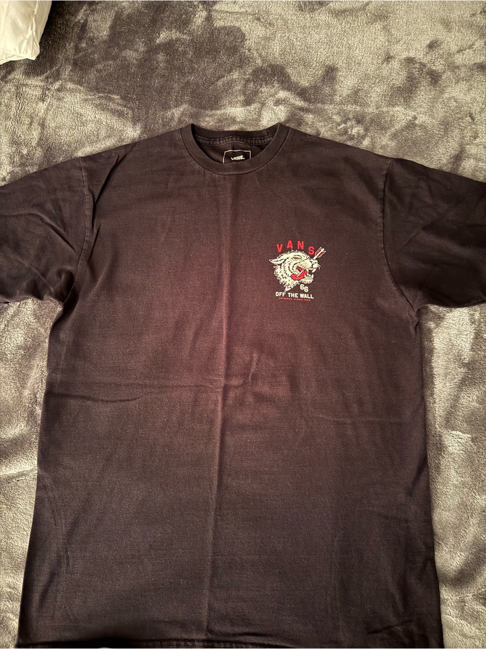 Vans Black Short Sleeve Tee with Red & White Wolf Logo
